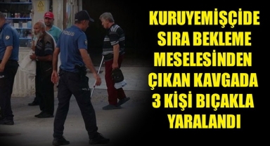 KURUYEMİŞÇİDE SIRA BEKLEME MESELESİNDEN ÇIKAN KAVGADA 3 KİŞİ BIÇAKLA YARALANDI