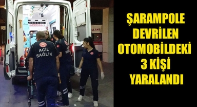 ŞARAMPOLE DEVRİLEN OTOMOBİLDEKİ 3 KİŞİ YARALANDI