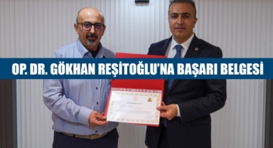  OP. DR. GÖKHAN REŞİTOĞLU’NA BAŞARI BELGESİ